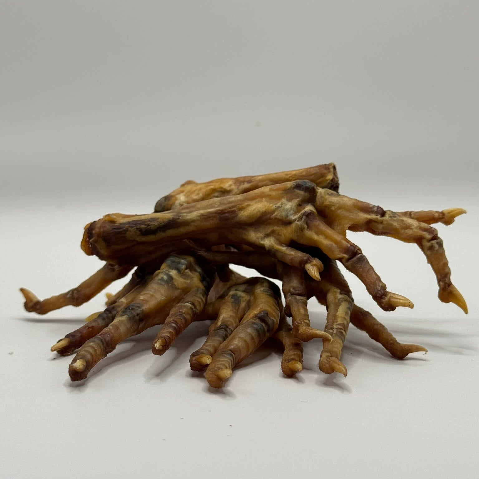 Crunchy dehydrated chicken feet dog treats, natural source of glucosamine for joint health