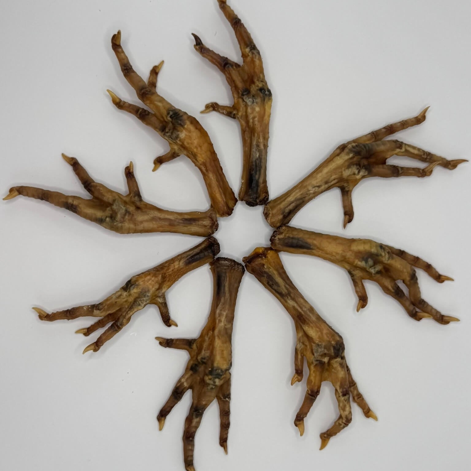 Crunchy dehydrated chicken feet dog treats, natural source of glucosamine for joint health