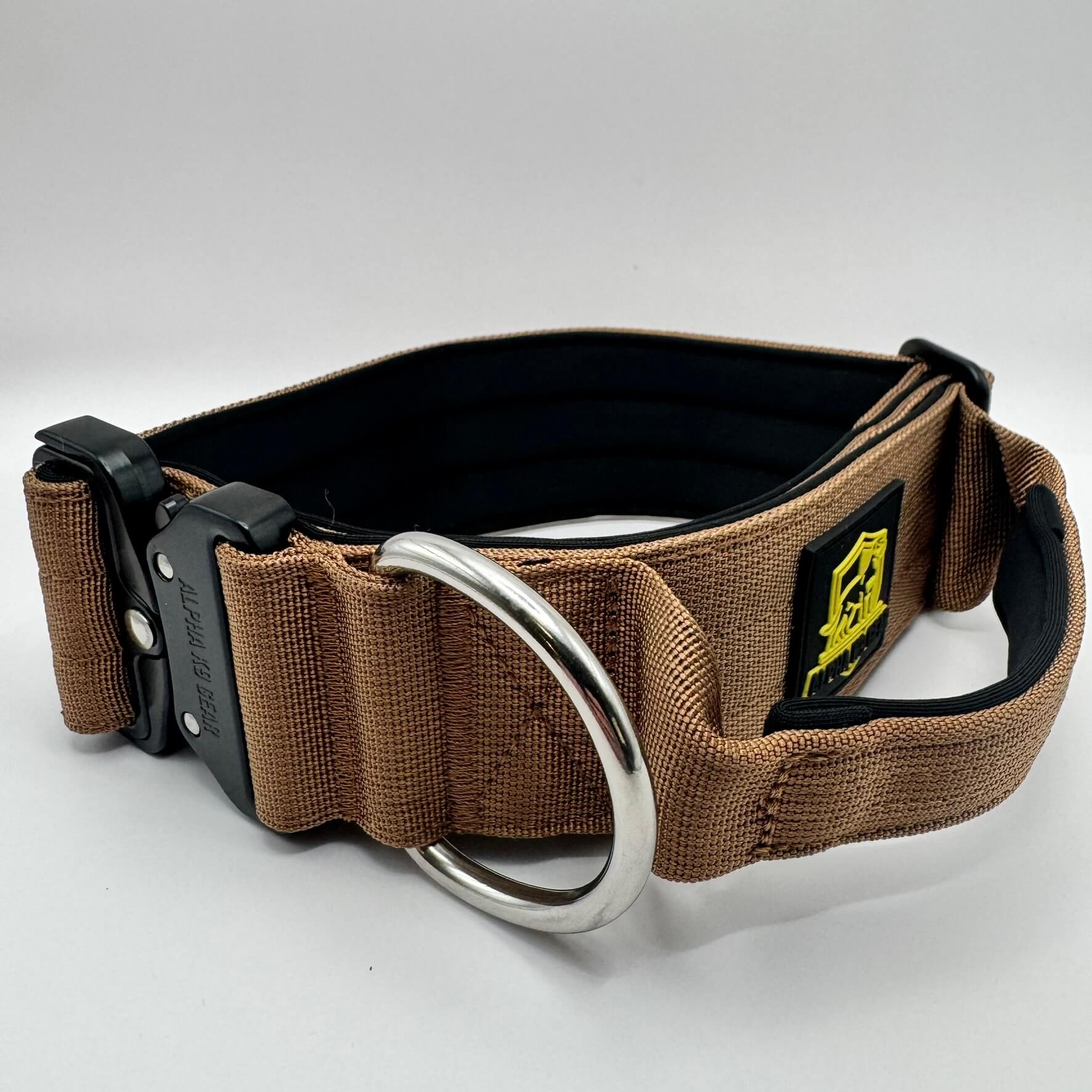 Official Alpha K9 Gear Black Tactical Dog Collar, featuring a signature heavy-duty quick-release metal buckle, reinforced control handle, and premium double-layered nylon engineered for large breeds