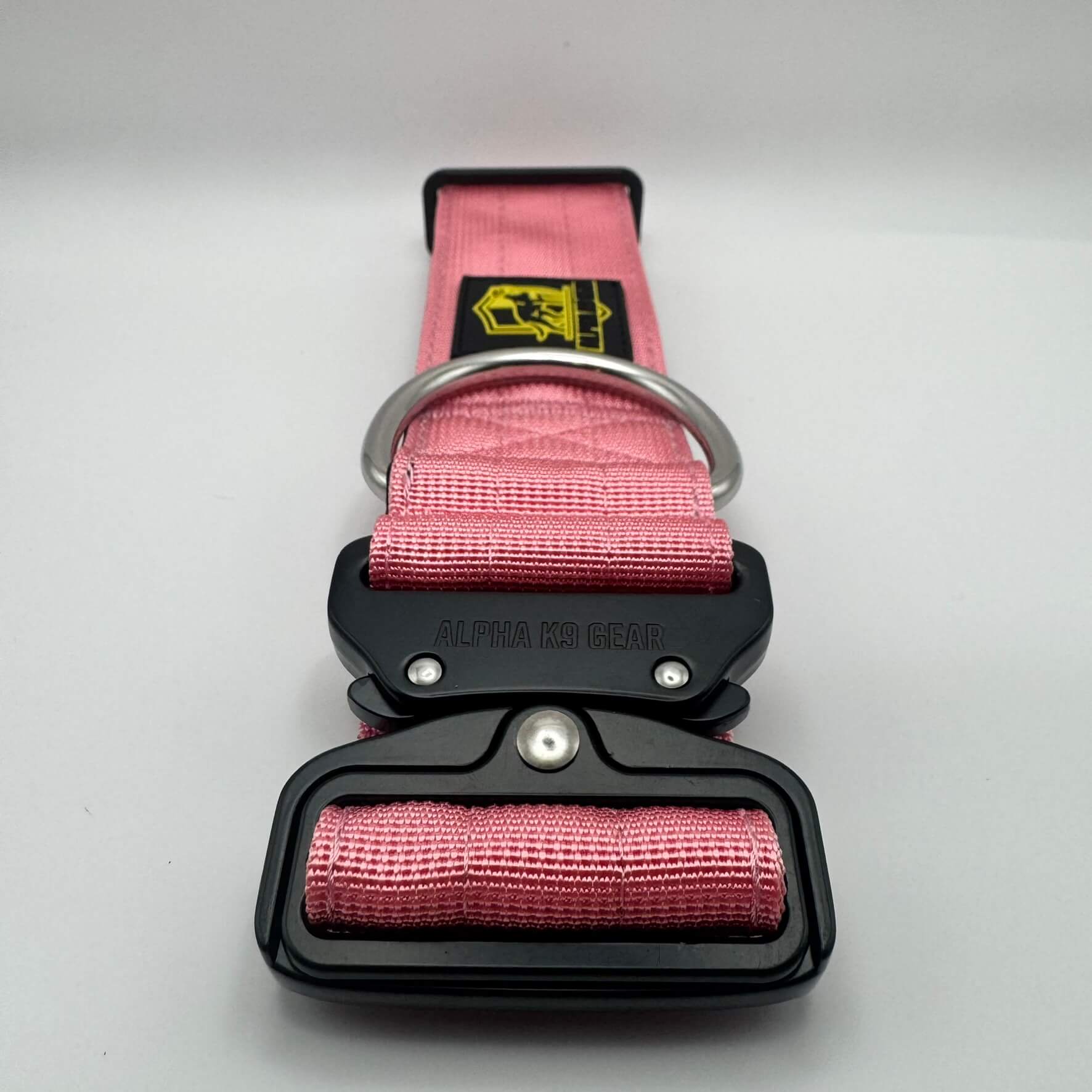 Pink heavy-duty tactical dog collar for large dogs, featuring high-strength nylon, quick-release metal buckle, and signature Alpha K9 Gear branding.
