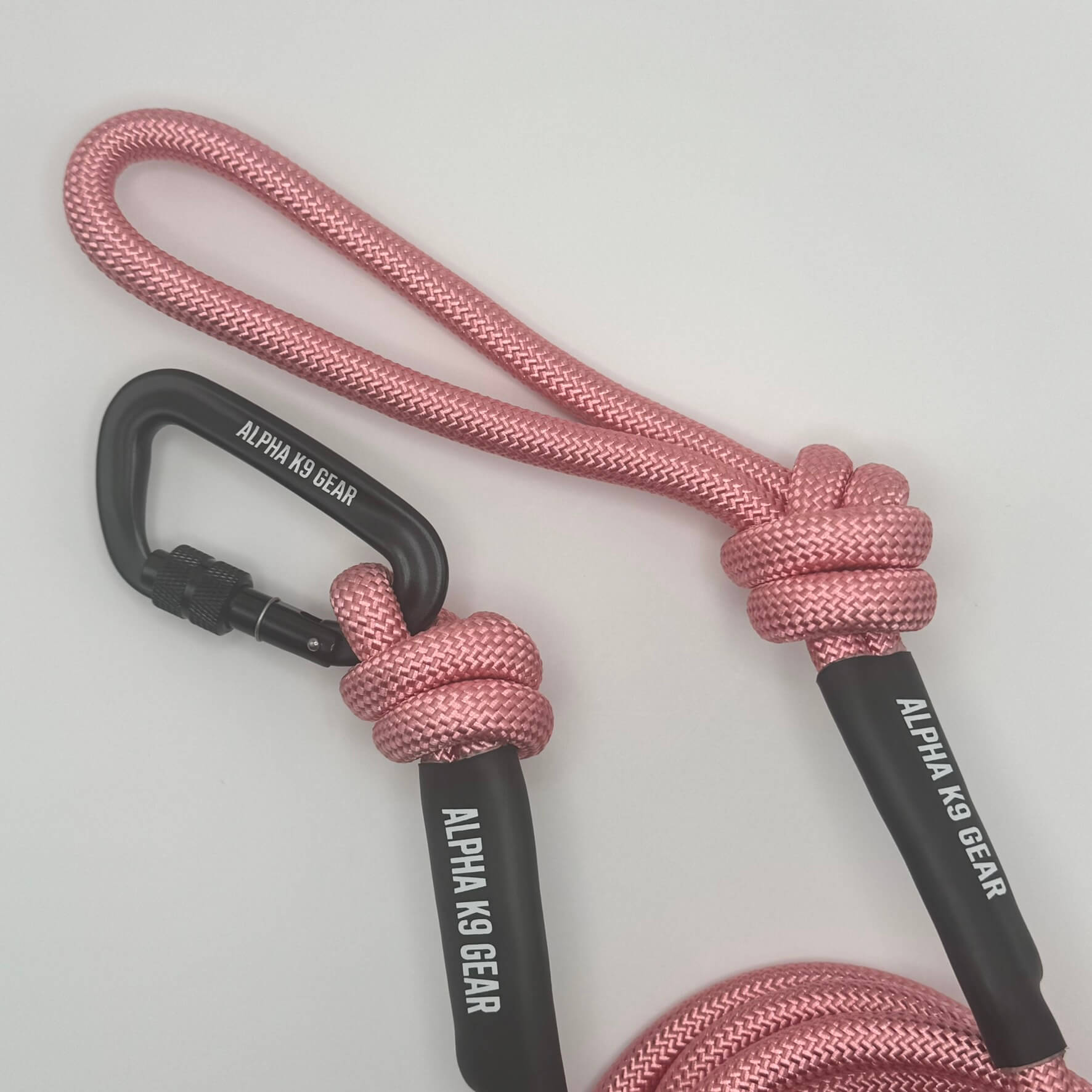 Pink heavy-duty rope dog lead with secure black screw-gate carabiner for large, powerful dogs.
