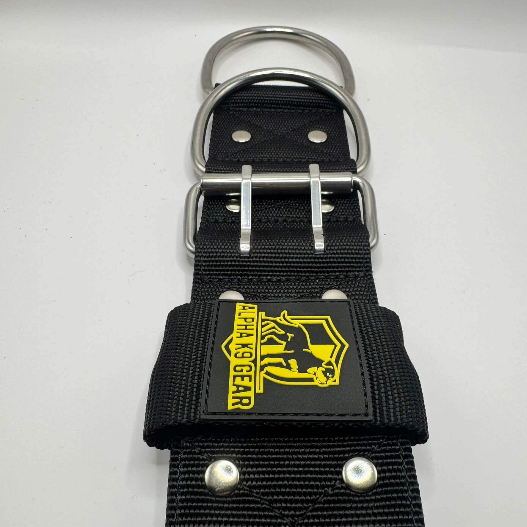 Official Alpha K9 Gear 7cm Extreme Heavy-Duty Dog Collar, featuring a massive 7cm wide profile, marine-grade stainless steel hardware, and thick internal padding. Specifically engineered for the world's most powerful breeds to provide maximum control, comfort, and unbreakable strength