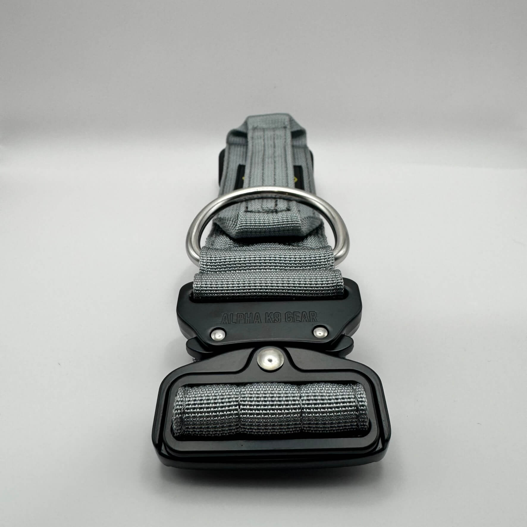 Official Alpha K9 Gear Grey Tactical Dog Collar, featuring a signature heavy-duty quick-release metal buckle, reinforced control handle, and premium double-layered nylon engineered for large breeds