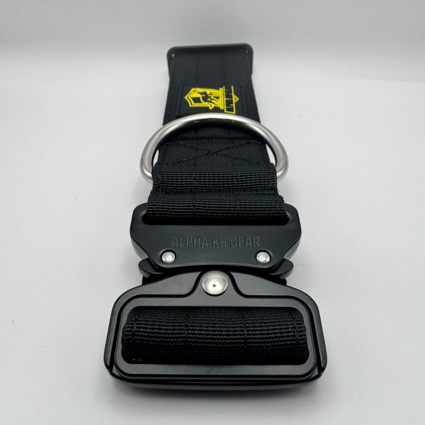 Black heavy-duty tactical dog collar for large dogs, featuring high-strength nylon, quick-release metal buckle, and signature Alpha K9 Gear branding.
