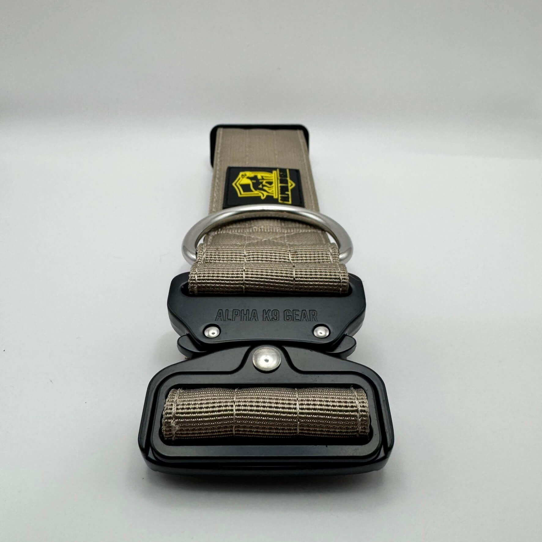 Beige heavy-duty tactical dog collar for large dogs, featuring high-strength nylon, quick-release metal buckle, and signature Alpha K9 Gear branding.