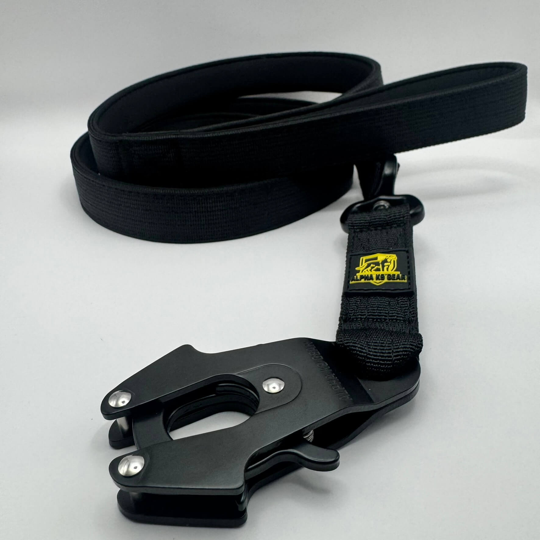 Black heavy-duty tactical dog collar with stainless steel hardware and Alpha K9 Gear branding