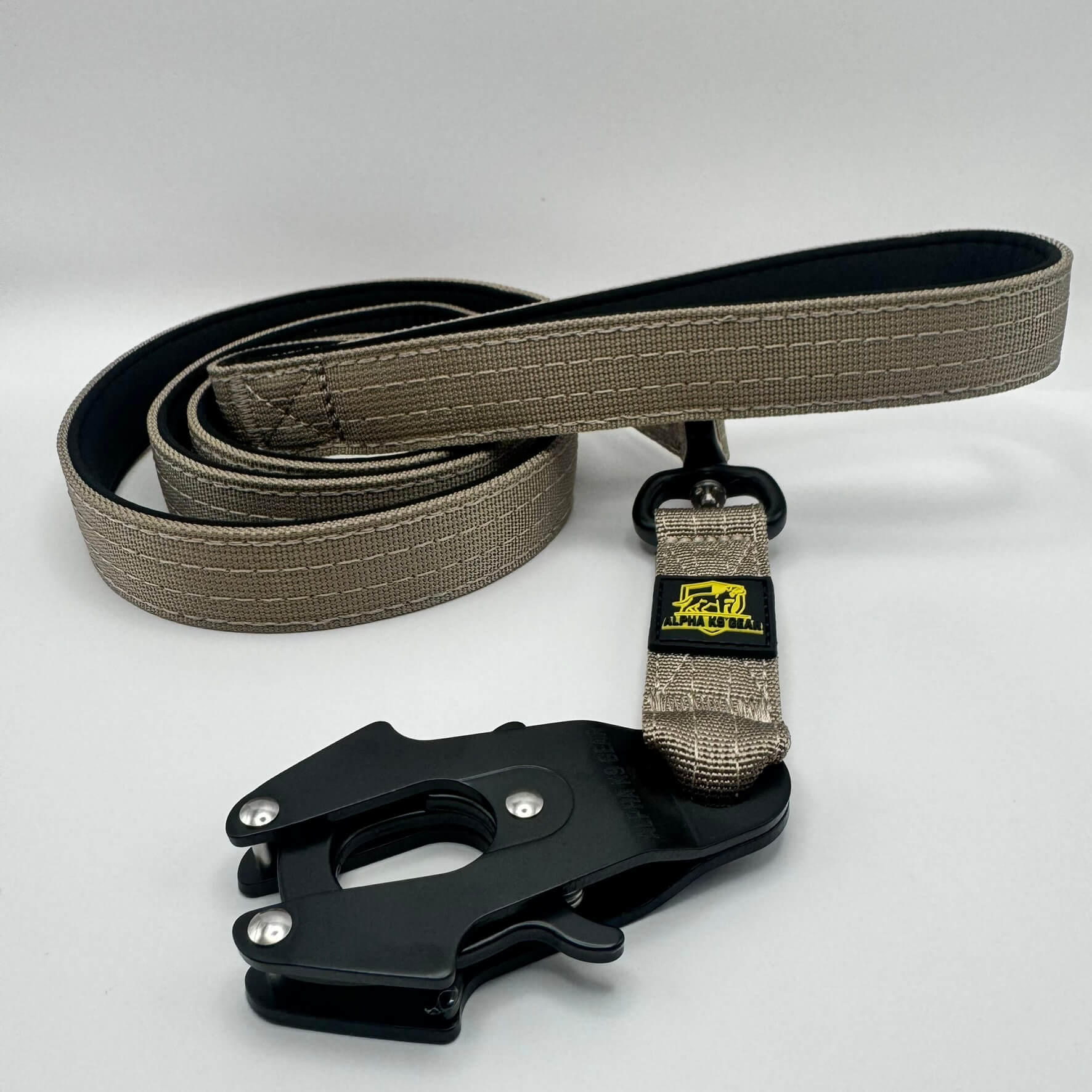 Beige heavy-duty tactical dog collar with stainless steel hardware and Alpha K9 Gear branding