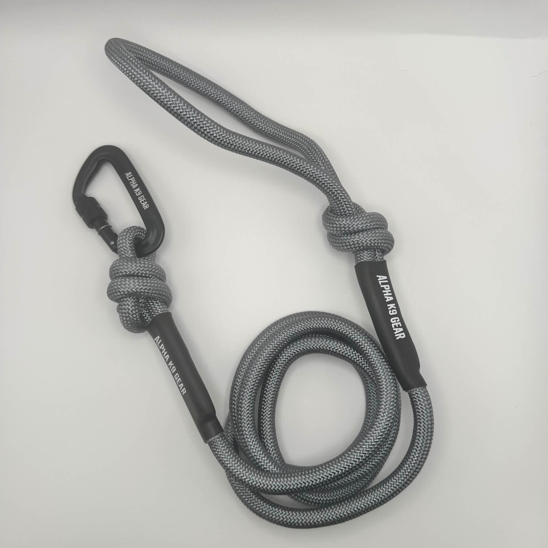 Grey heavy-duty rope dog lead with secure black screw-gate carabiner for large, powerful dogs.