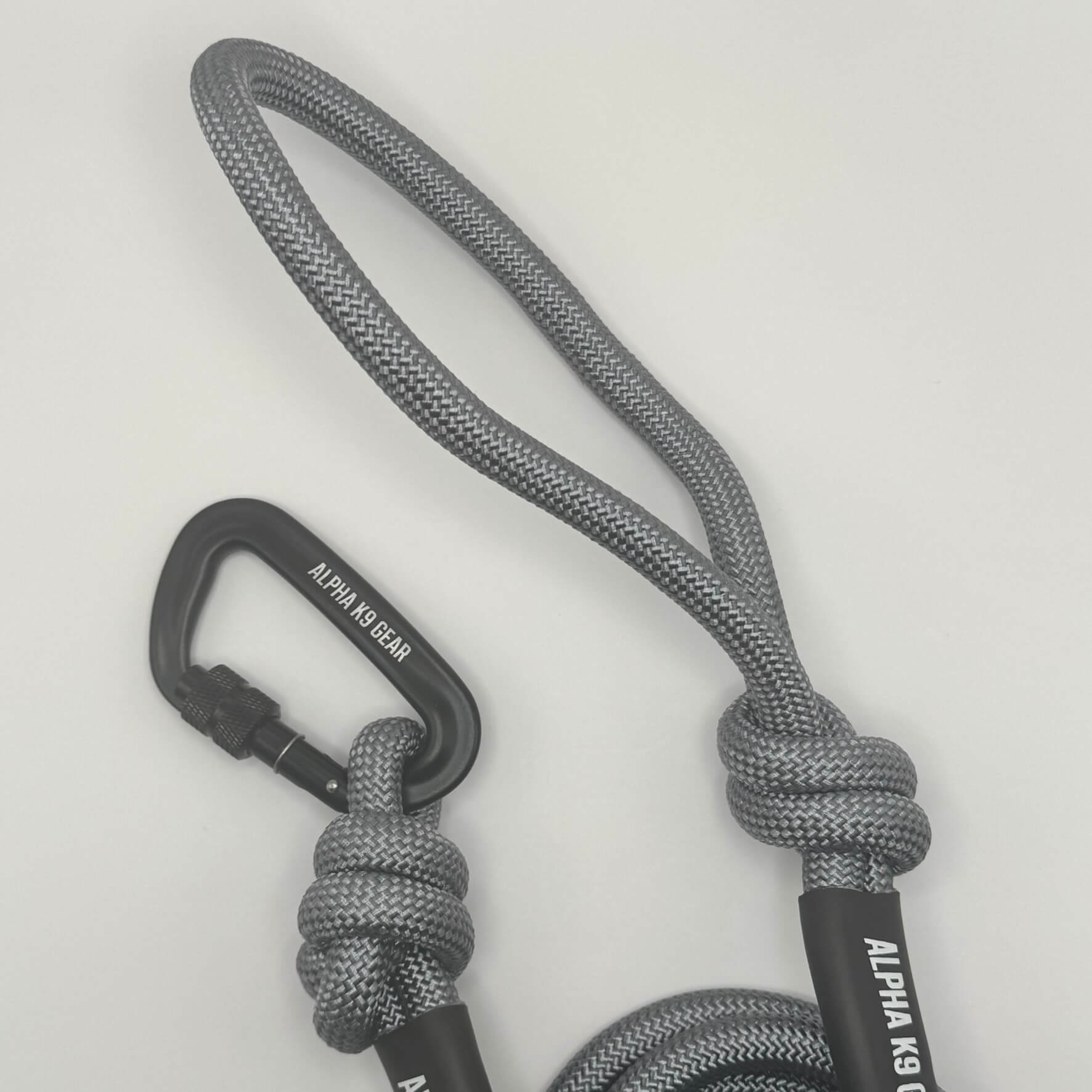 Grey heavy-duty rope dog lead with secure black screw-gate carabiner for large, powerful dogs.