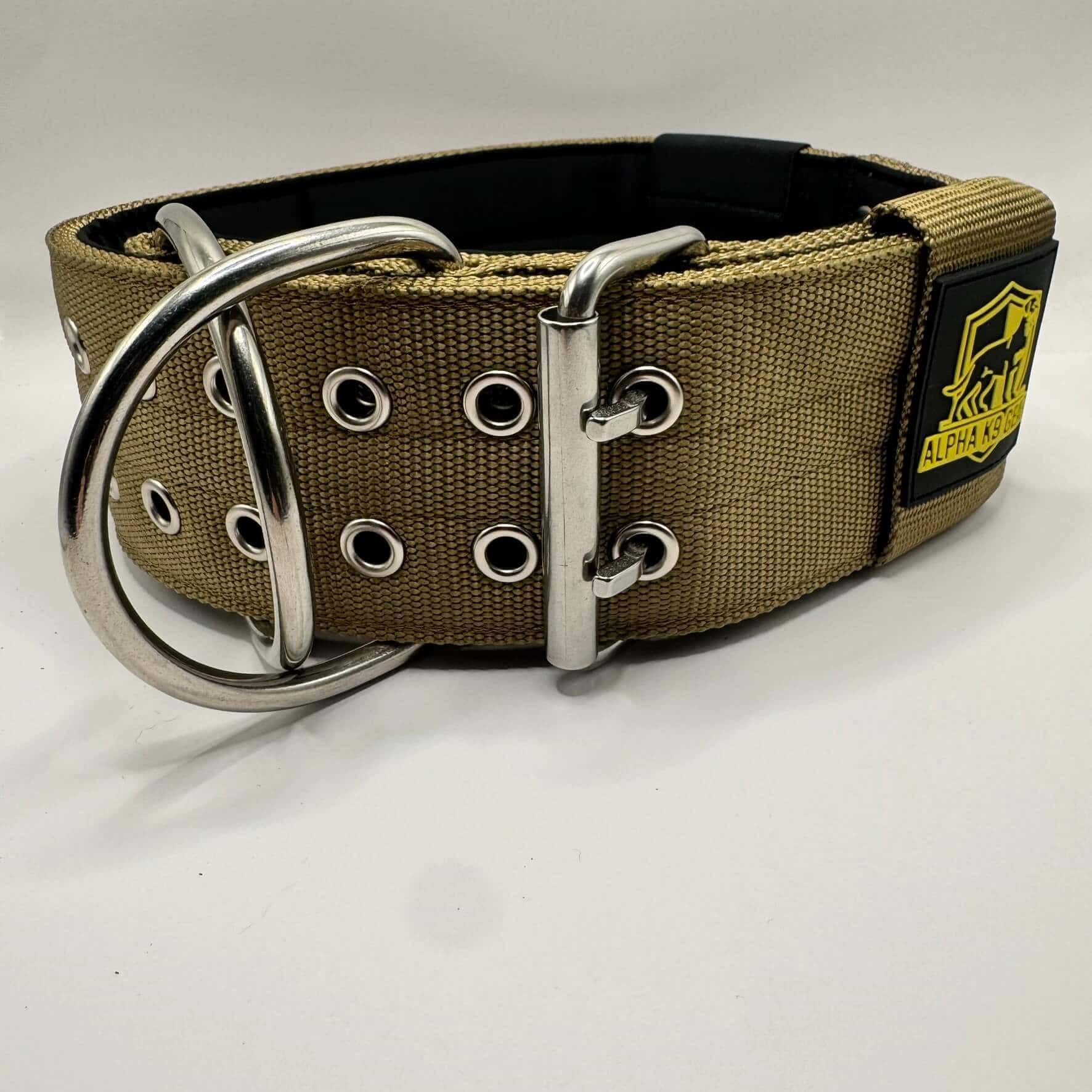 Official Alpha K9 Gear 7cm Extreme Heavy-Duty Dog Collar, featuring a massive 7cm wide profile, marine-grade stainless steel hardware, and thick internal padding. Specifically engineered for the world's most powerful breeds to provide maximum control, comfort, and unbreakable strength